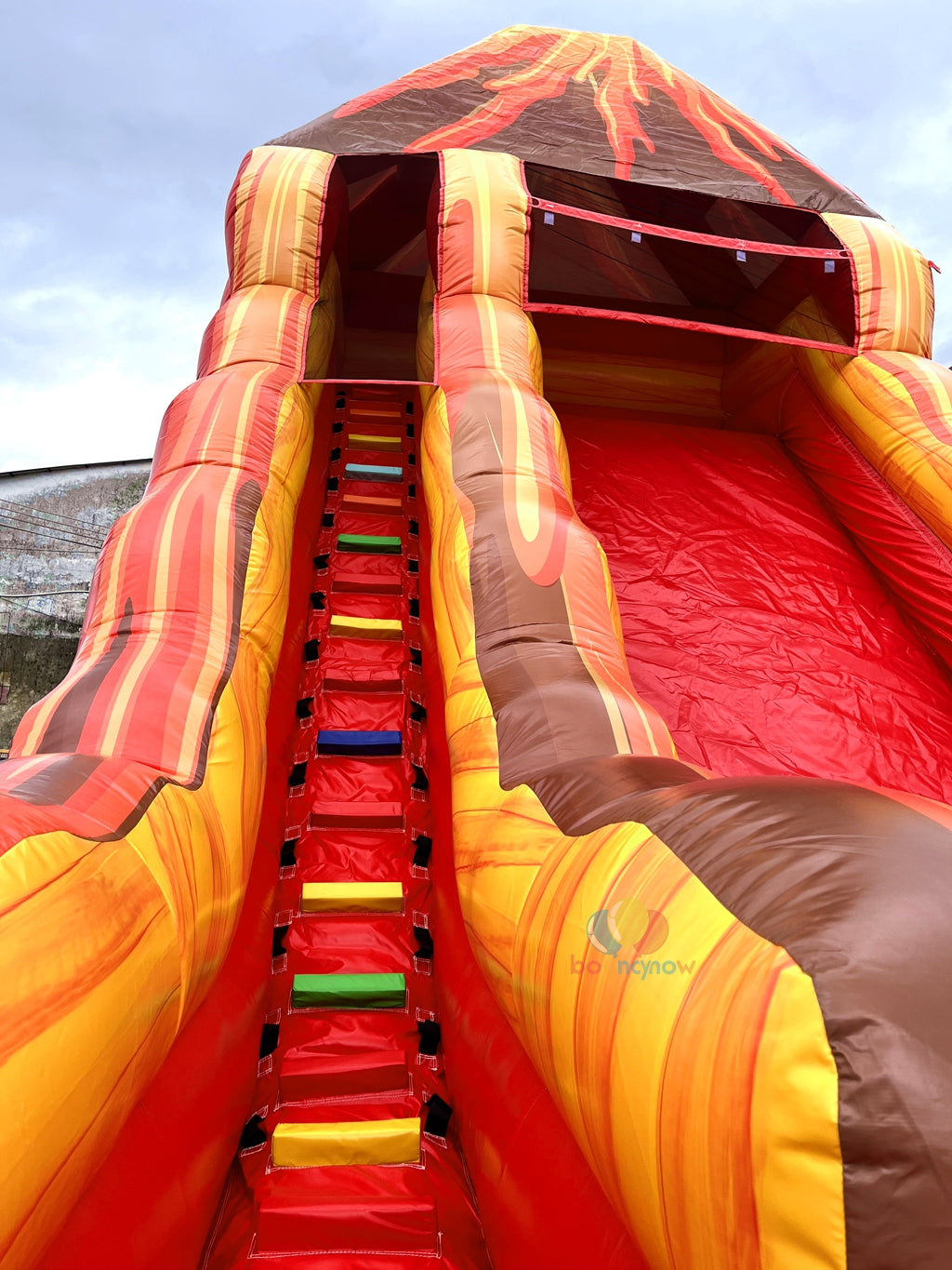 Exciting Volcano Themed Inflatable Water Slide Outdoor Play Adventure erfect for Family Gatherings