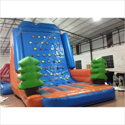 Amusement Park Inflatable Rock Climbing Wall Sports Games Straight Inflatable Climb Wall With The Pine Trees
