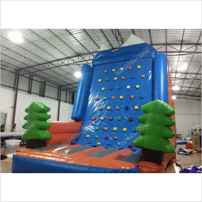 Amusement Park Inflatable Rock Climbing Wall Sports Games Straight Inflatable Climb Wall With The Pine Trees